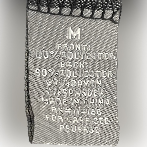 RETRO-ology Black Ivory Geometric Print Dolman Short Sleeve Hi-Low Top - Picture 4 of 4